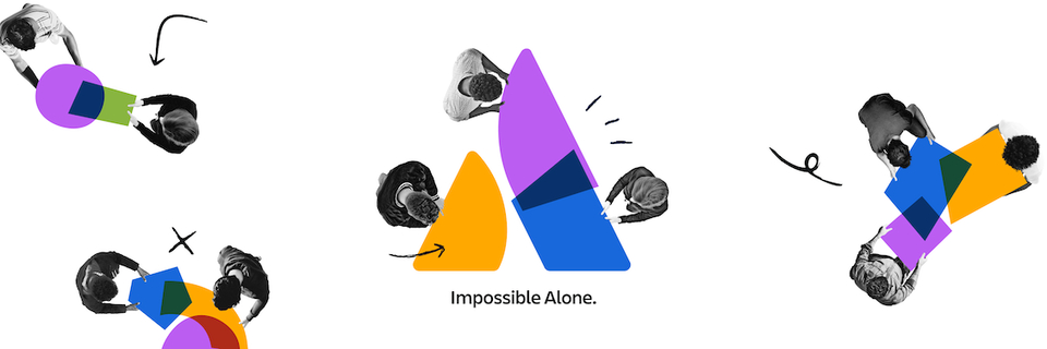 Multiple employees collaborating on work