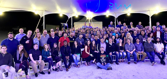 Large group photo of NinjaOne employees