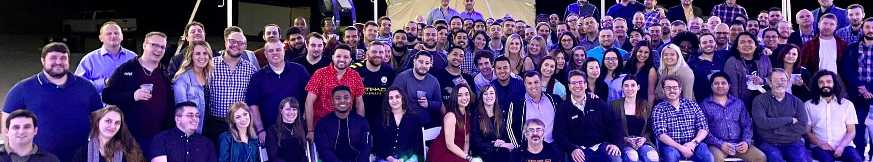 Large group photo of NinjaOne employees